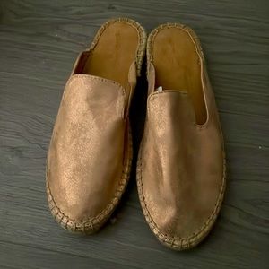 Slip on rose gold lightweight shoes.